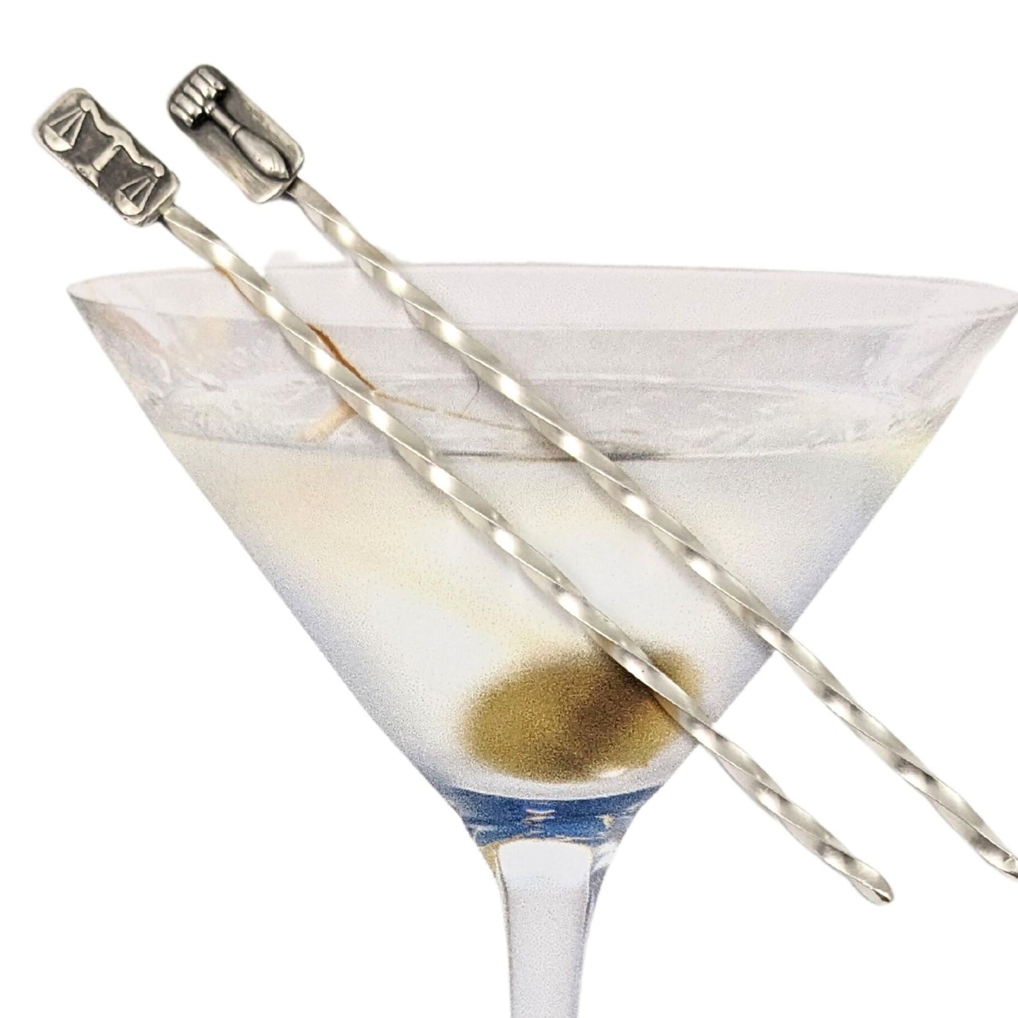 Sterling silver cocktail pick. One pick has the scales of justice at the top, the other has a gavel. Wire portion of the pick is twisted.