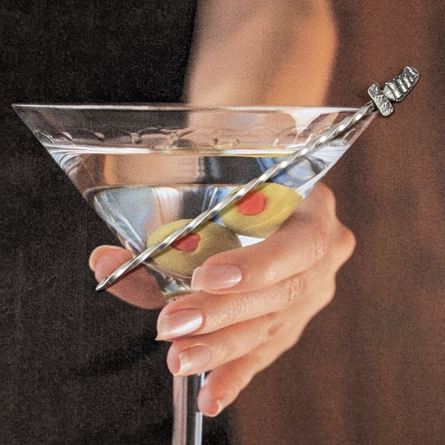 Tall ship sterling silver cocktail pick.