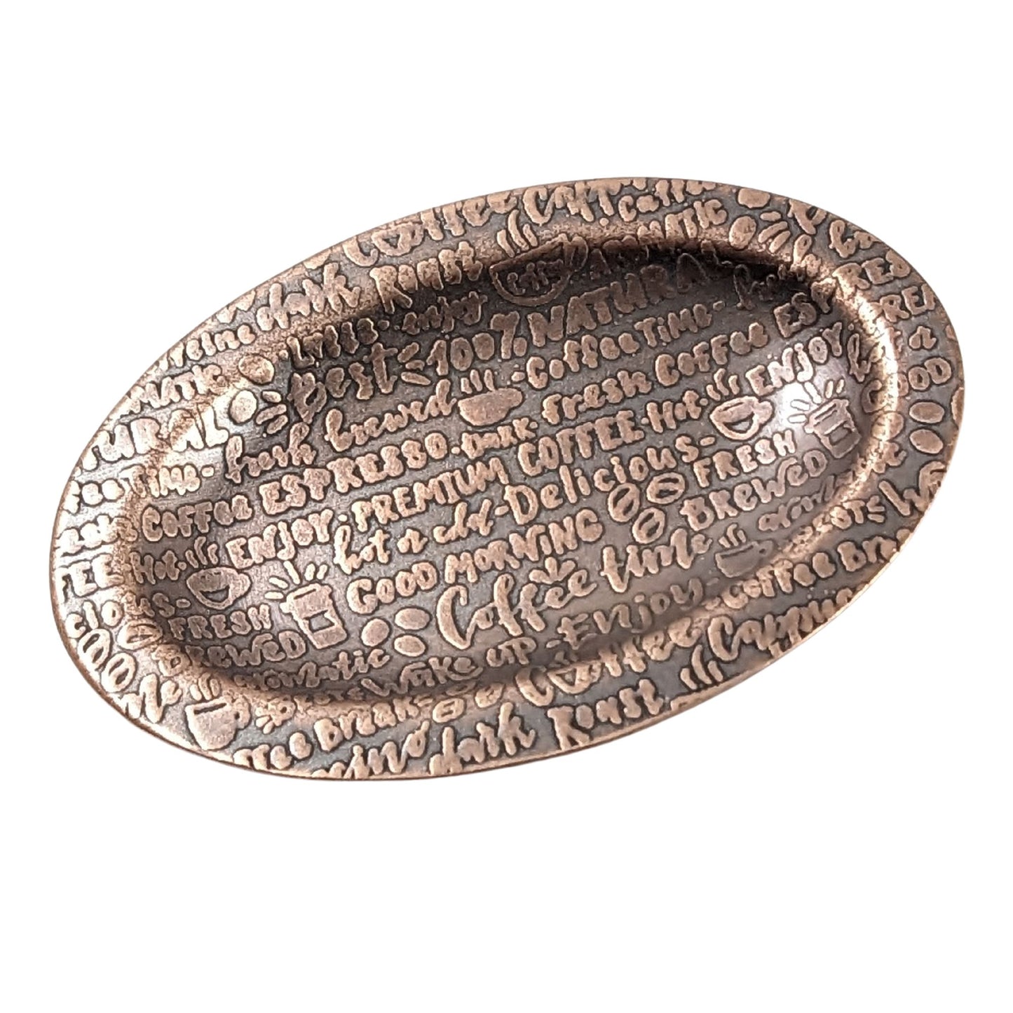 An oval copper ring dish with a raised edge. The dish has an impressed words that describe coffee like premium, good morning, wake up, fresh brewed, expresso, and more.