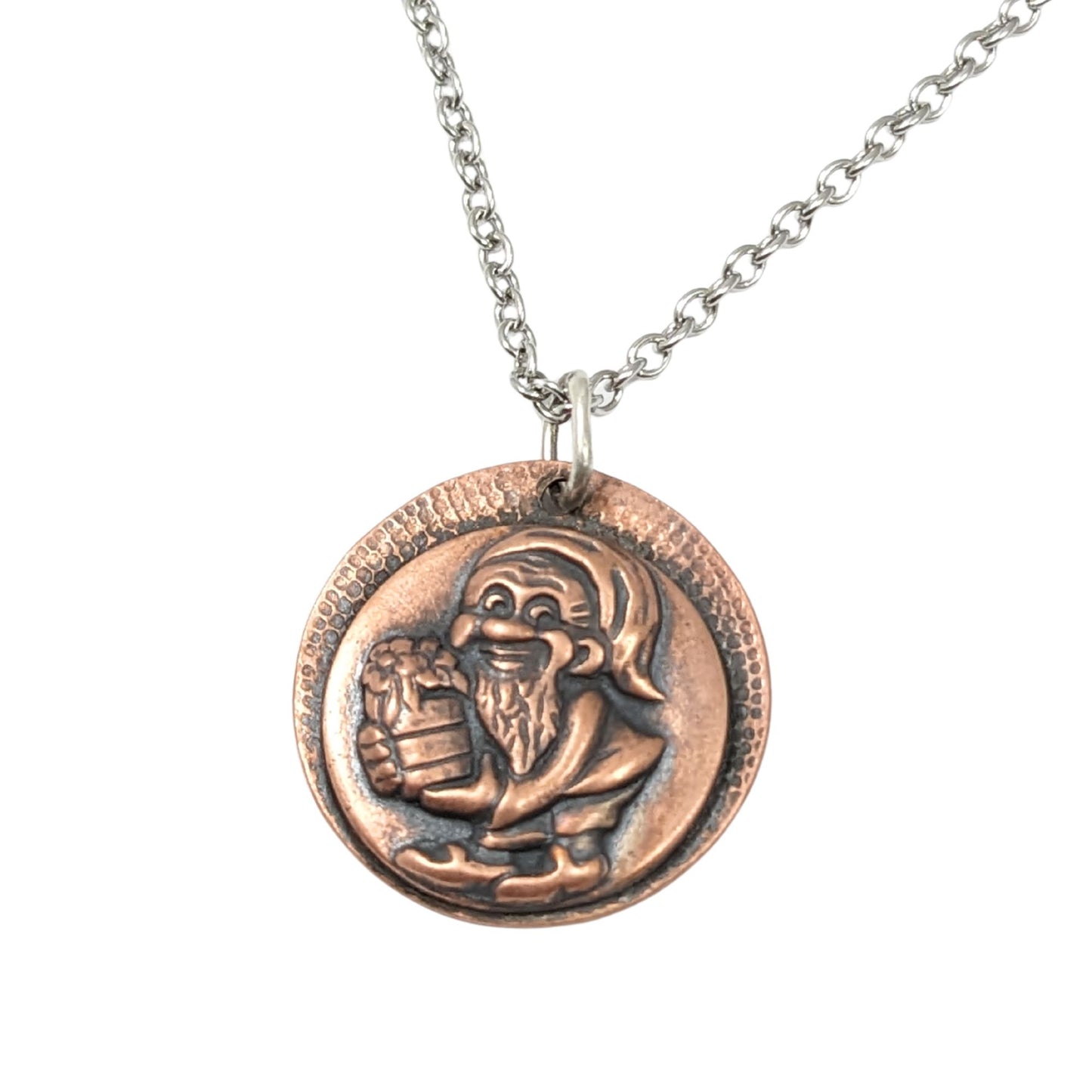 copper pendant with a garden gnome holding a barrel of produce