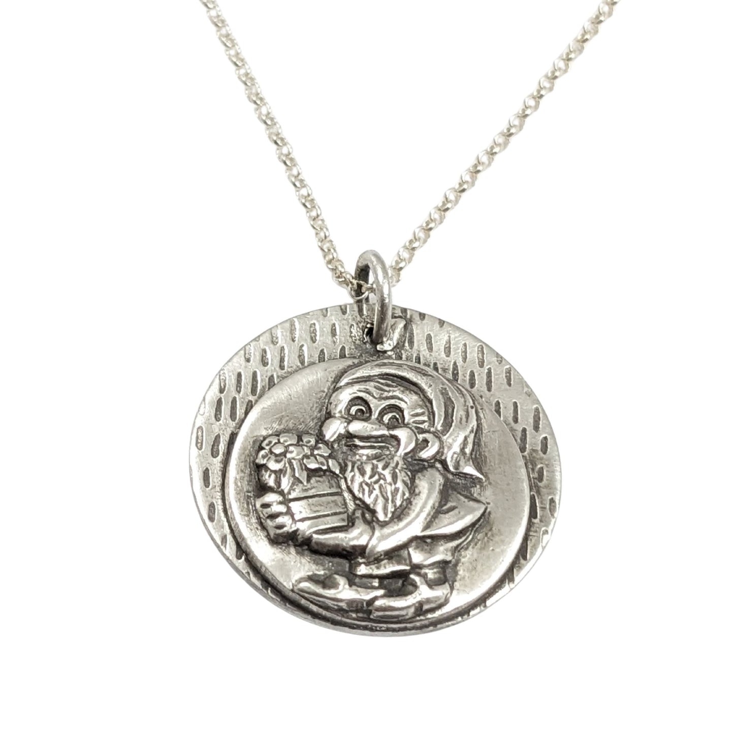 silver pendant with a garden gnome holding a barrel of produce