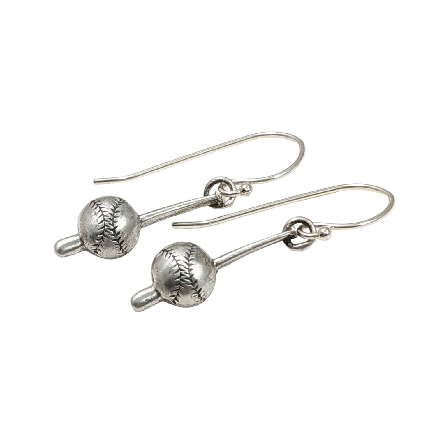 Sterling silver dangle earrings. Each earring is in the shape of a baseball bat. Toward the bottom of the bat there's a large baseball.