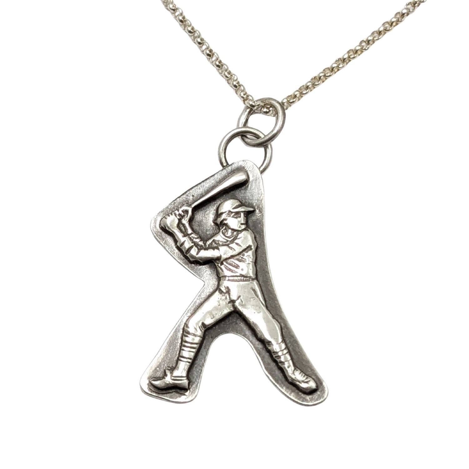 Silver pendant of a baseball player in a batter's stance on a chain