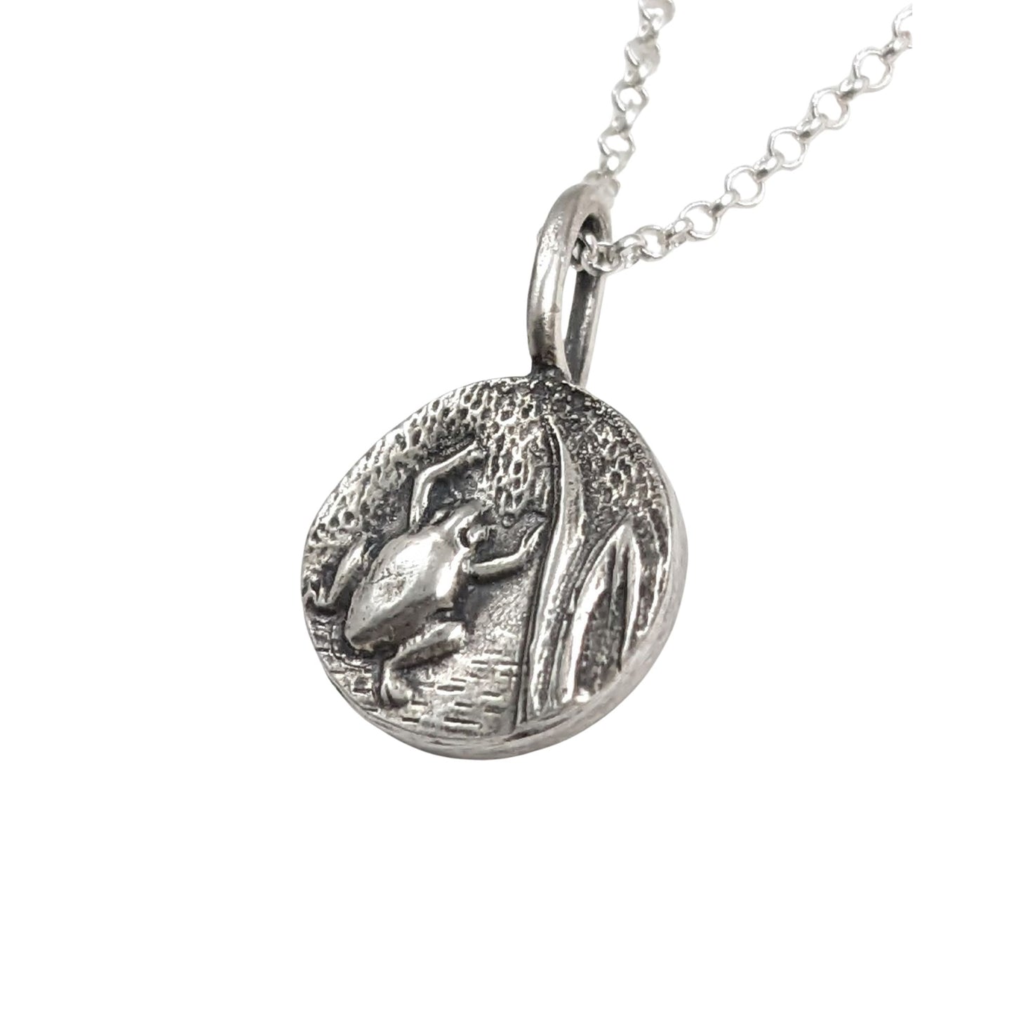 Round sterling silver pendant with frog  design