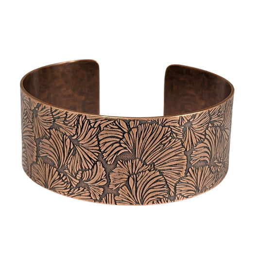 Copper cuff bracelet with a ginkgo leaf pattern design