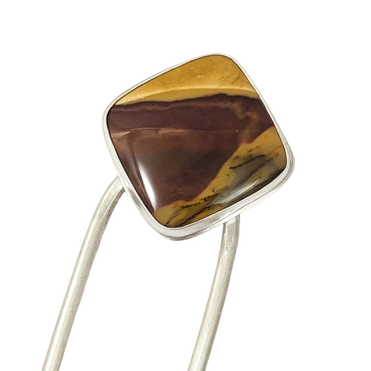 Silver hair fork with a large square red and orangish-yellow cabochon stone