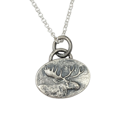 Silver necklace with a moose design