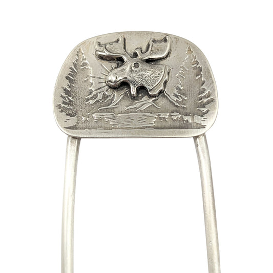 sterling silver hair fork, featuring a large and detailed moose head on a background of mountains, evergreens, and a lake.