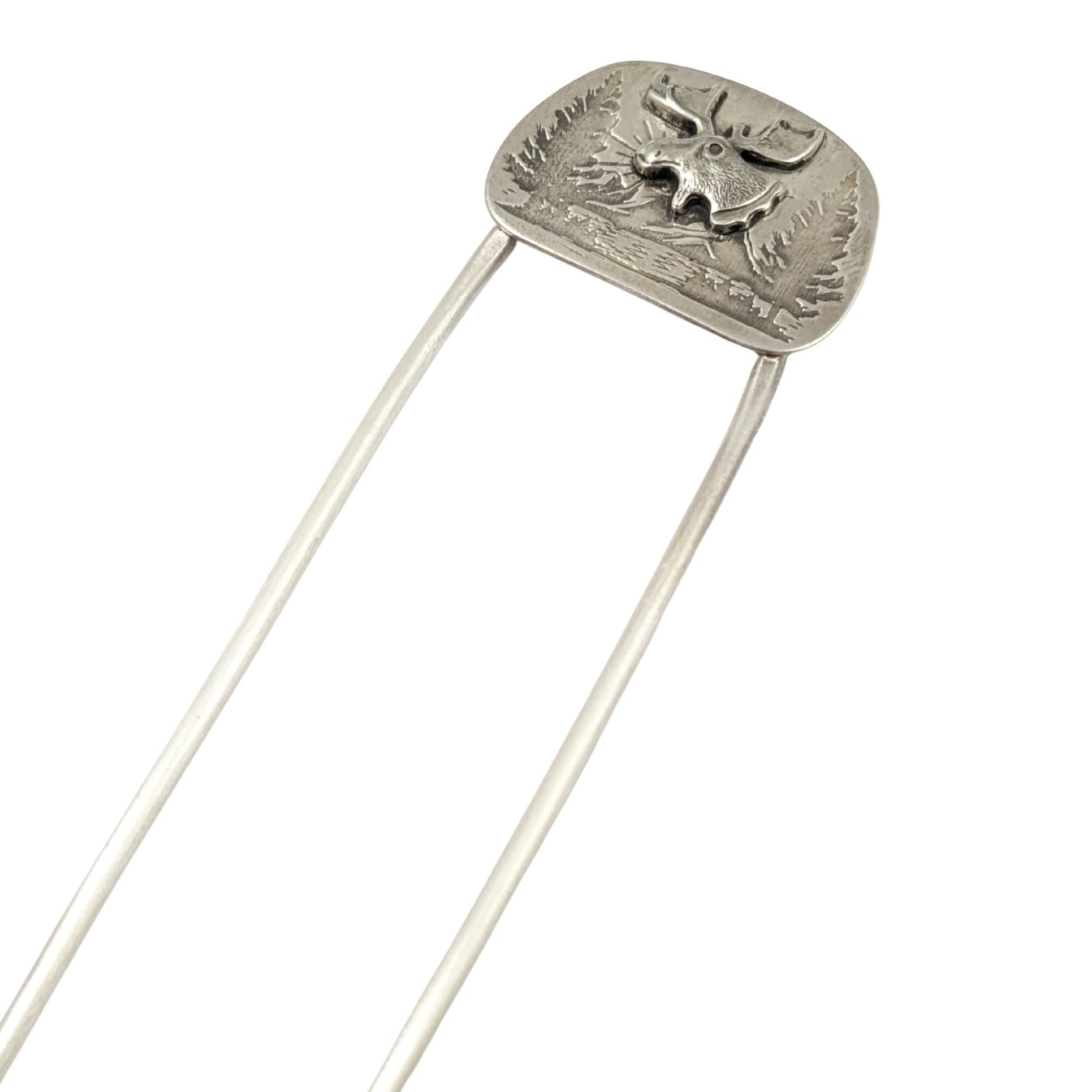 sterling silver hair fork, featuring a large and detailed moose head on a background of mountains, evergreens, and a lake.