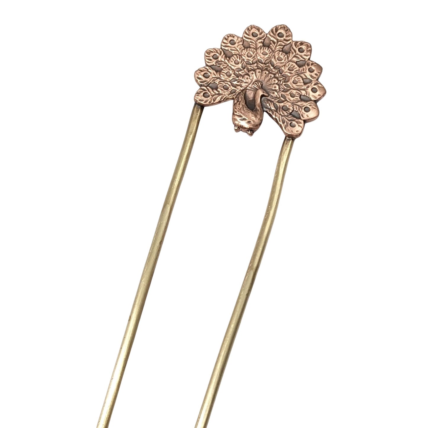 Copper hair fork of a peacock displaying it's plumage. Fork is brass.