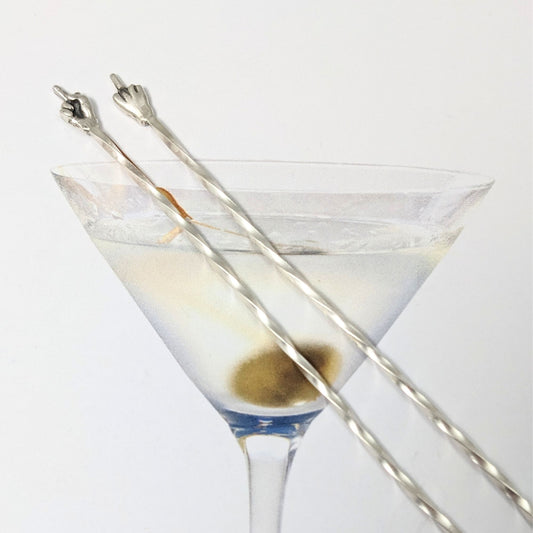 Pair of sterling silver cocktail picks. At the top is a hand with the middle finger raised, ie flipping the bird. One hand faces toward you, the other faces away.