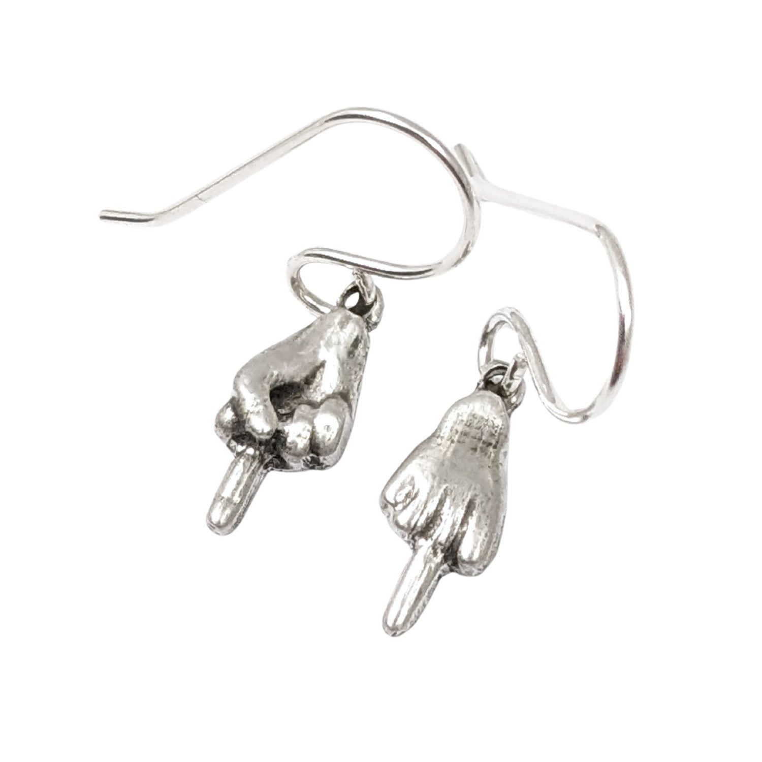 Small sterling silver earrings of hand with the middle finger raised. One hand faces forward, the other faces backward.