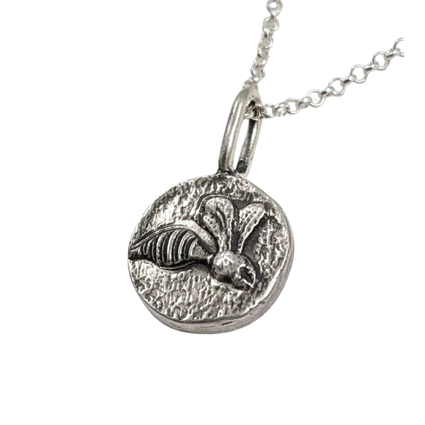 Round sterling silver pendant with wasp design