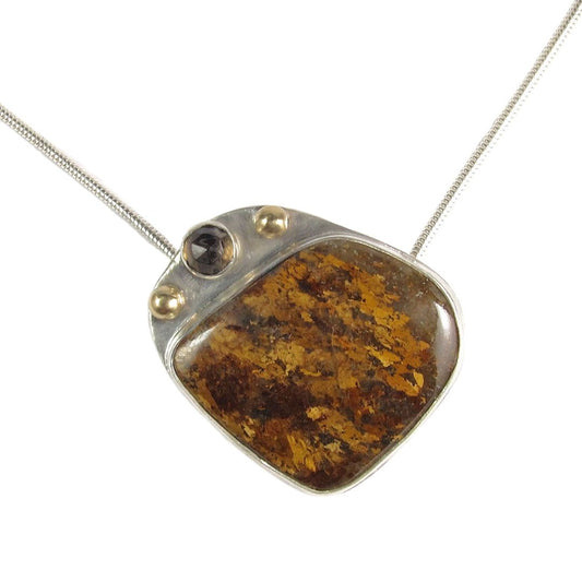 Layers of golds and browns in an Amphibole pendant sterling silver with 14K gold accents.