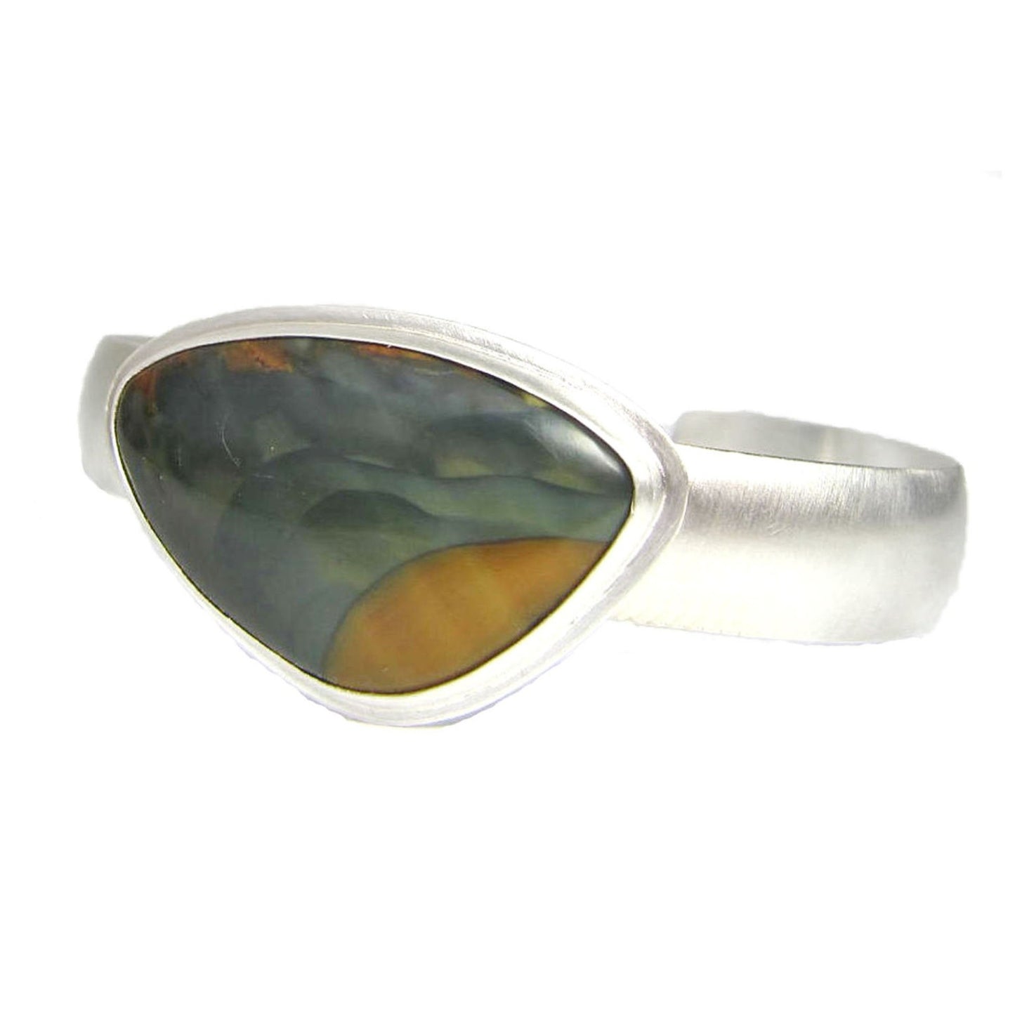 Blue Mountain Oregon Jasper silver cuff bracelet. The stone is blue and golden colors, the cuff is softly domed